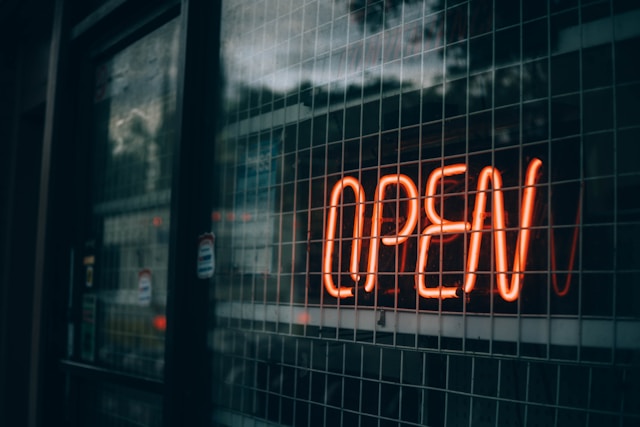 An open sign of a store front.